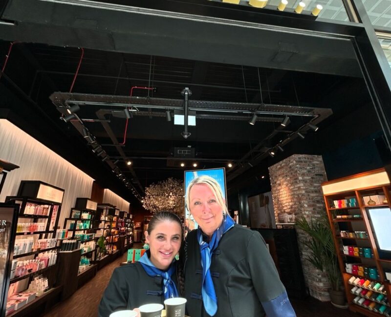 Two friendly employees stood at the front of the Rituals store at Manchester Arndale