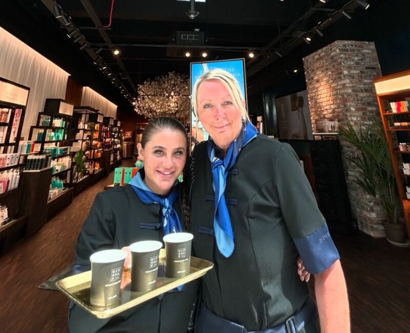 Two friendly employees stood at the front of the Rituals store at Manchester Arndale