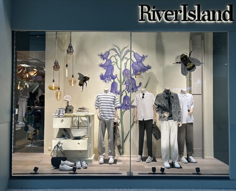 External store front of River Island inside Manchester Arndale