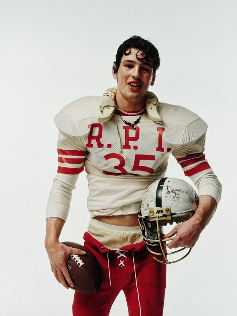 Champion model wearing American style football sportswear