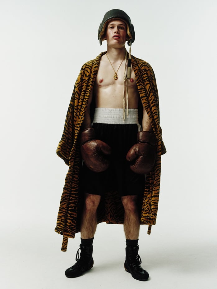 Champion male model wearing boxing style sportswear